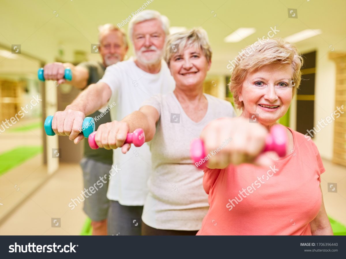 stock-photo-sporty-senior-group-with-dumbbells-for-rehabilitation-for-muscle-building-and-strength-1706396440
